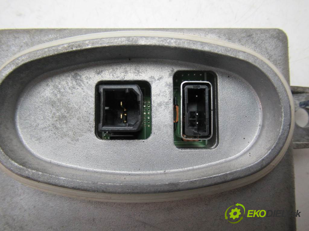BMW E90       0  měnič xenon 6948180